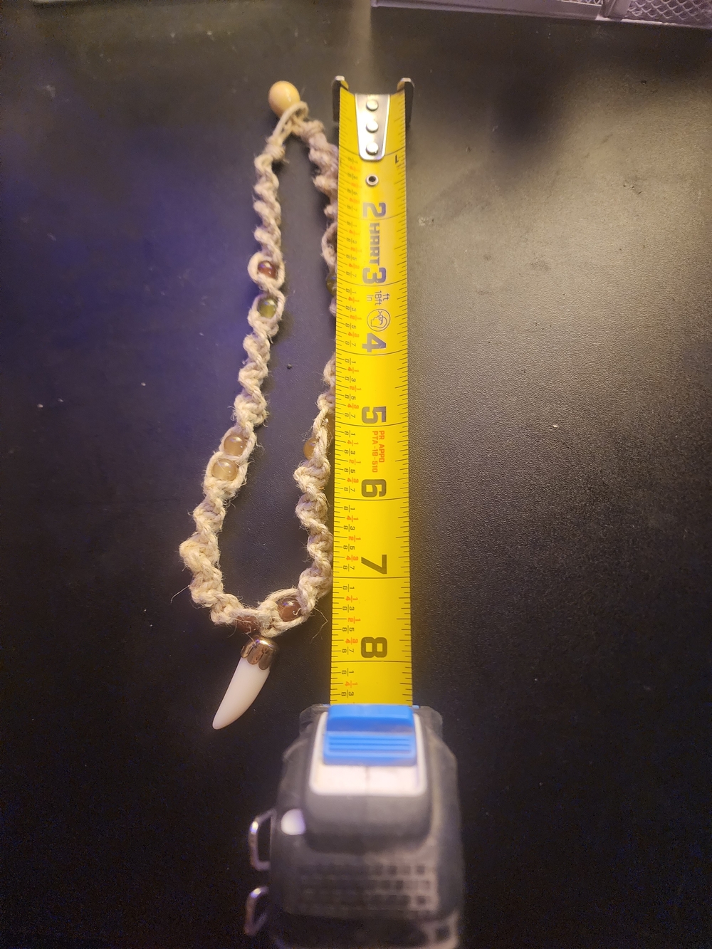 Handmade Beige Macrame Necklace with Amber Beads and White Tooth Pendant